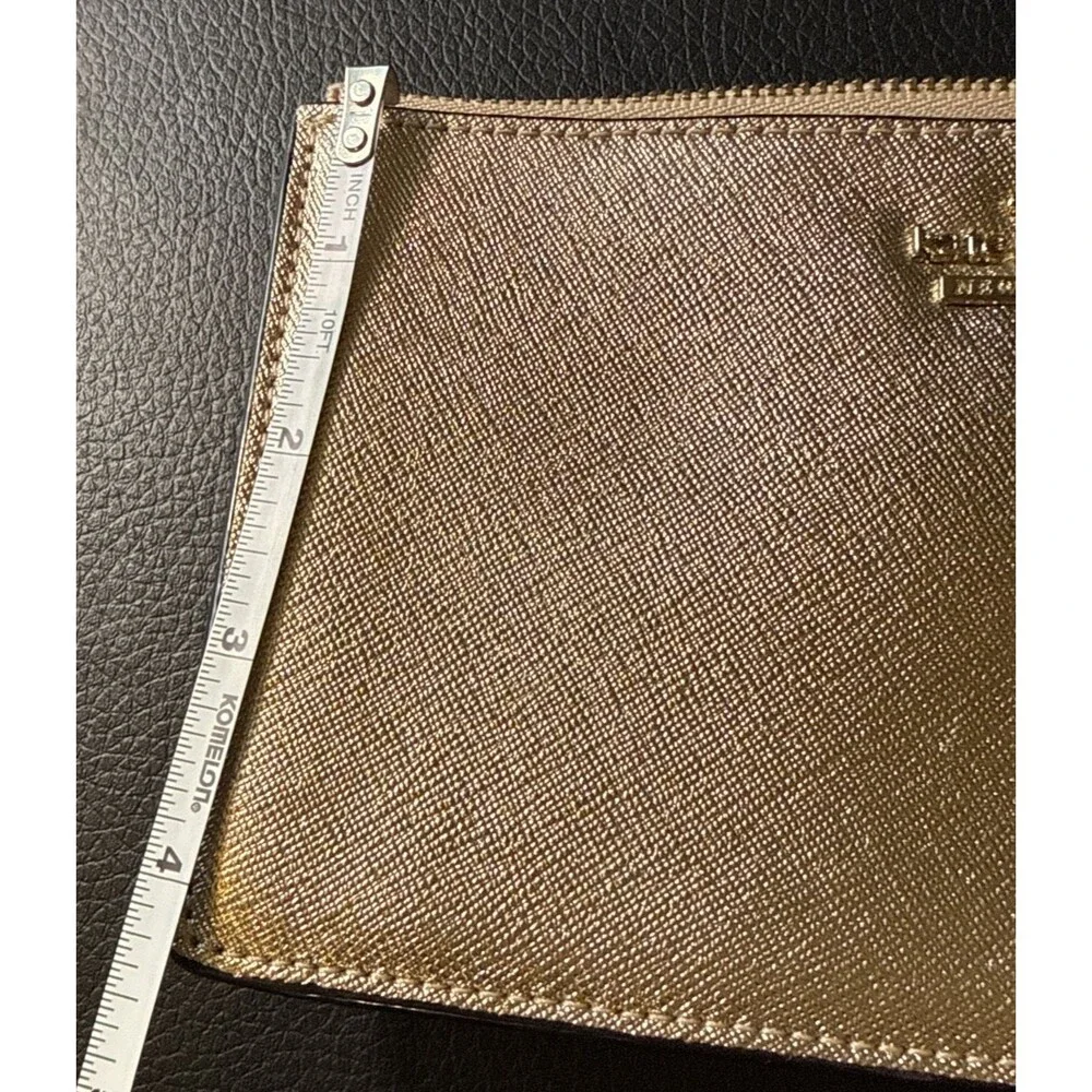Kate Spade Metallic Gold Leather Wristlet Measuring 7 x 4 1